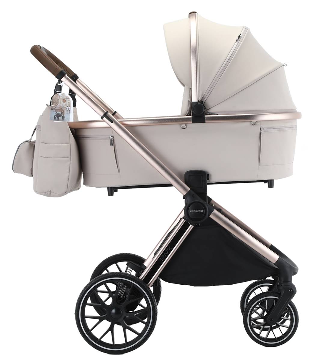 Beżowy wózek dziecięcy Adamex Spark Champagne 2w1 z gondolą – elegancki i nowoczesny wózek dla niemowlaka