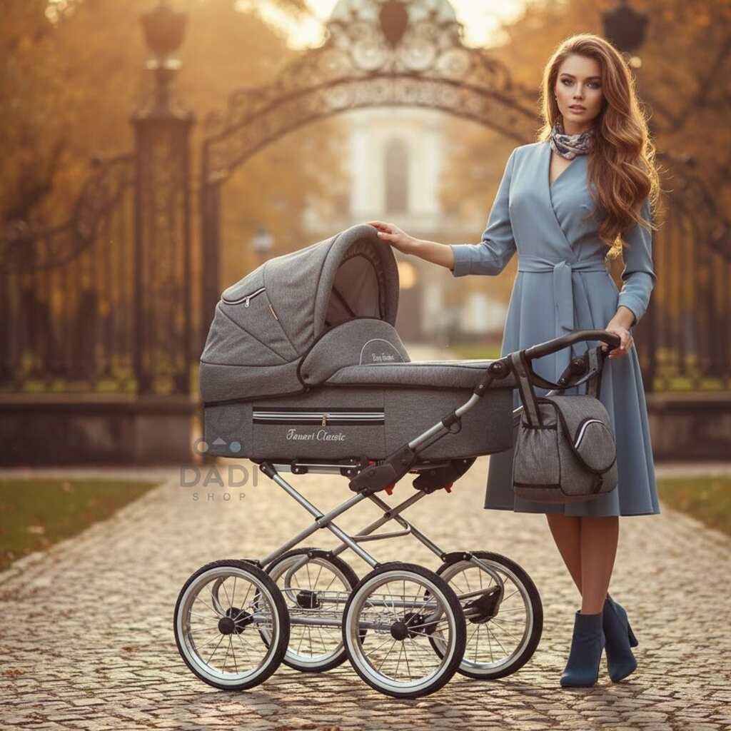 Grafitowy wózek retro Fanari na dużych kołach z kobietą w błękitnej sukni na tle parku i bramy.