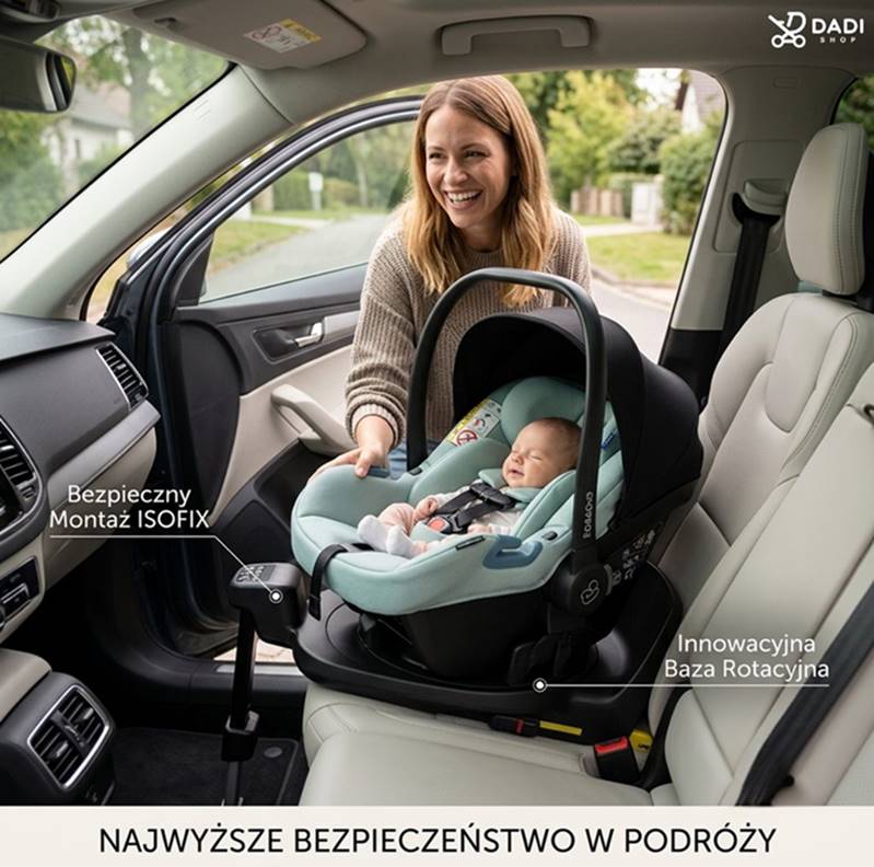 Rodzic wpina fotelik z dziegciem do bazy obrotowej iq oribt obrócony bokiem.