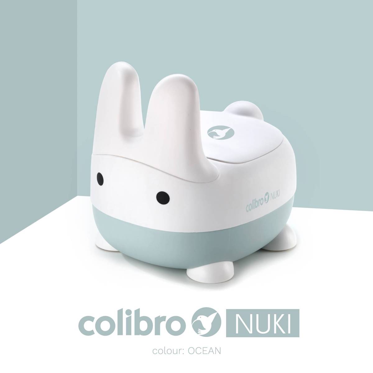 Nocnik dziecięcy Colibro NUKI Ocean na niebieskim tle.