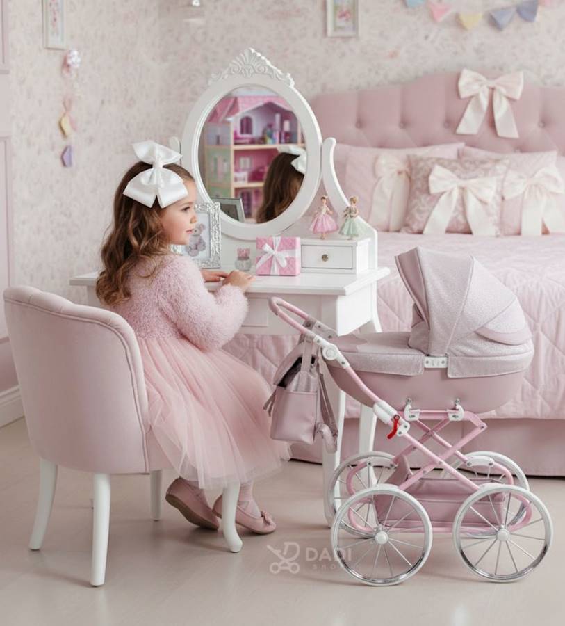 Pink doll pram Junama Dolce Mini in retro style with large wheels – stylish and realistic toy stroller available at Dadi-Shop.