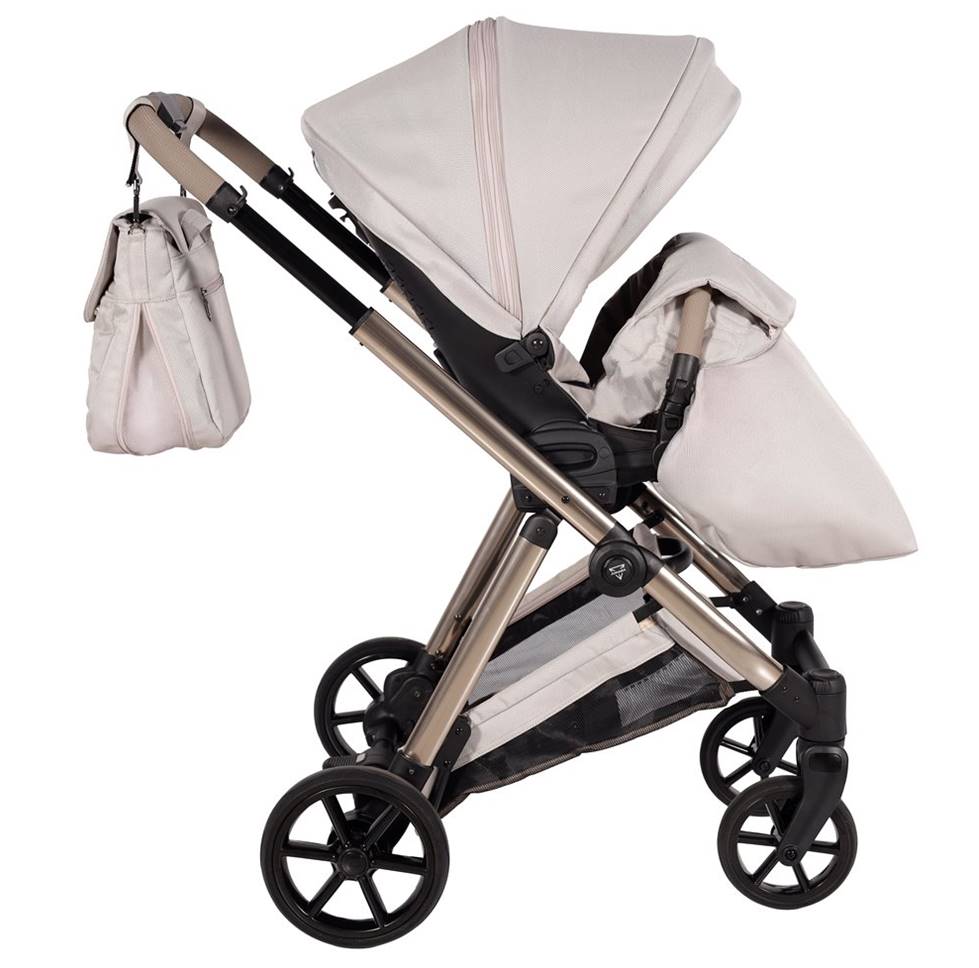 Junama Ellegante kremowy wózek spacerowy z pokrowcem na nogi – elegancki model dla dziecka dostępny w Dadi-Shop.