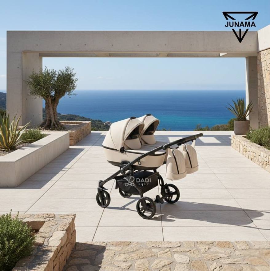 Junama Duo Space Eco 2-in-1 twin pram in beige leather  outdoor sunny day.