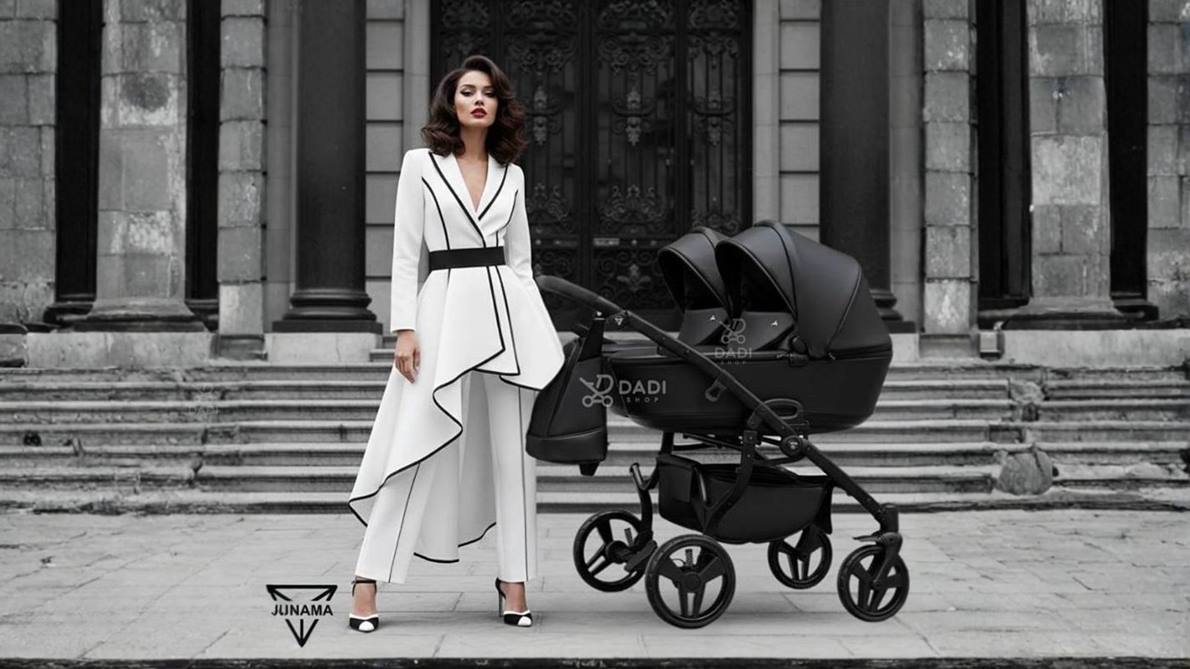 Chic mom with Junama Space Duo 03 Black twin pram side by side. Premium eco-leather version, best twin pram for modern parents.