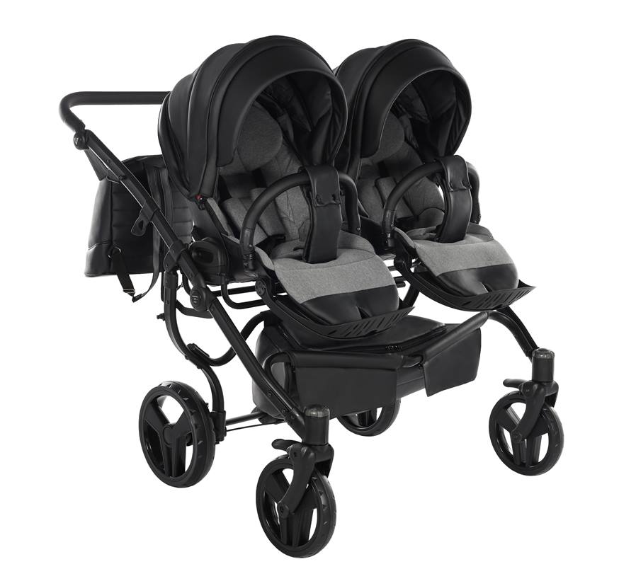 Regulowany podnóżek z czarnej eko-skóry w spacerówce Junama Space Duo.