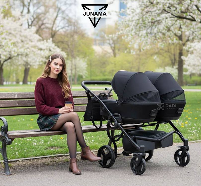 Junama Space Duo wózek dla bliźniąt 4w1 z przestronnymi gondolami – komfort i wygoda dla dzieci podczas spacerów w parku.