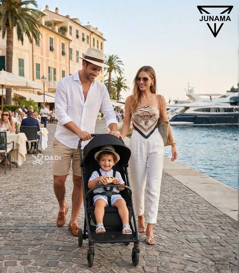 Family walking with Junama Aviator Black carbon travel stroller.