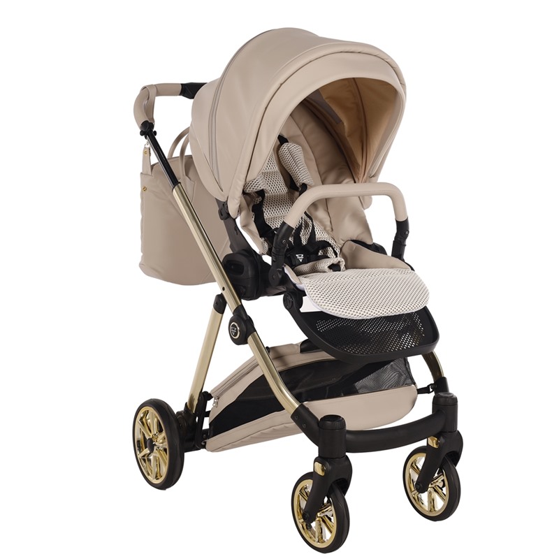 Beżowa spacerówka Junama Ellegante 02 Beige na złotym stelażu. Komfortowe siedzisko z miękką wkładką i torbą.