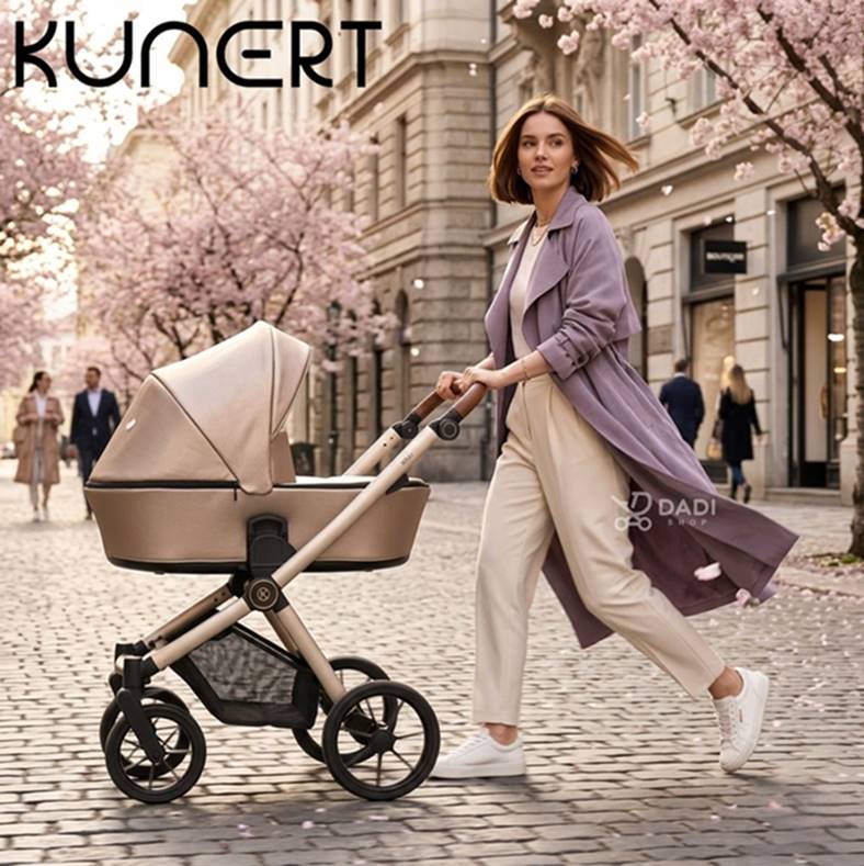 Elegancki wózek dziecięcy 2w1 Kunert Brav 13 w kolorze Cappuccino Eco (beżowa ekoskóra) z gondolą – mama spaceruje wiosną po mieście.