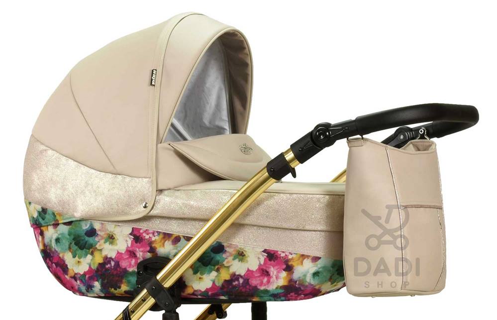 Zbliżenie na detale gondoli Wiejar Molokai Duo. Beżowy materiał w kwiaty i złote wykończenia wózka Modo Exclusive.