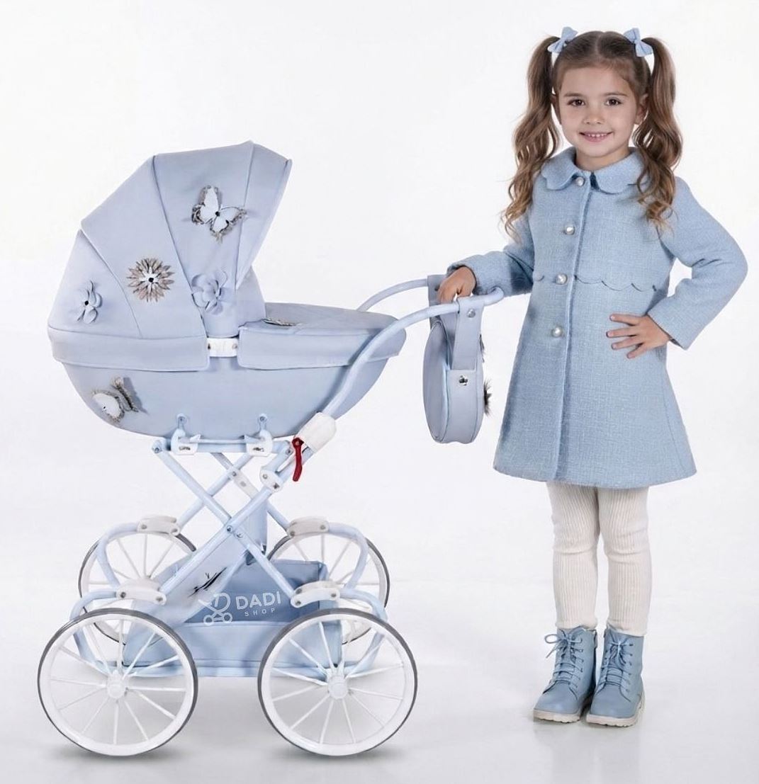 Elegant pale blue toy baby carriage featuring floral and butterfly accents, classic white chassis, and big spoked wheels.