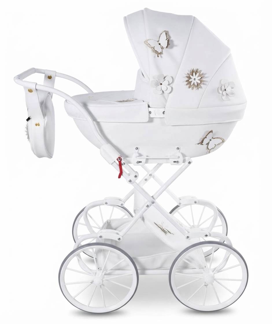 Junama Fleur Mini biały wózek retro z luksusowymi zdobieniami motyli. Widok studio z profilu, klasyczne duże koła, skórzana tapicerka,