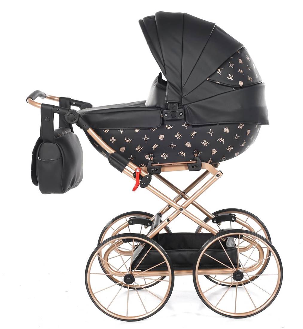 Elegancki wózek dla lalek retro od TAKO Baby w kolorze czarnym z elementami z eko-skóry i ozdobnymi wzorami – stabilna gondola i wyjątkowy design.