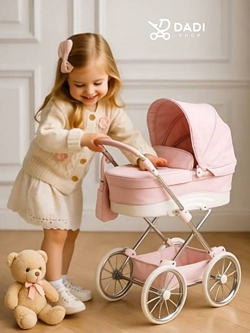 Stylish pink doll pram Junama Lulla with retro wheels. Doll stroller for 8 year old dadi-shop on-line