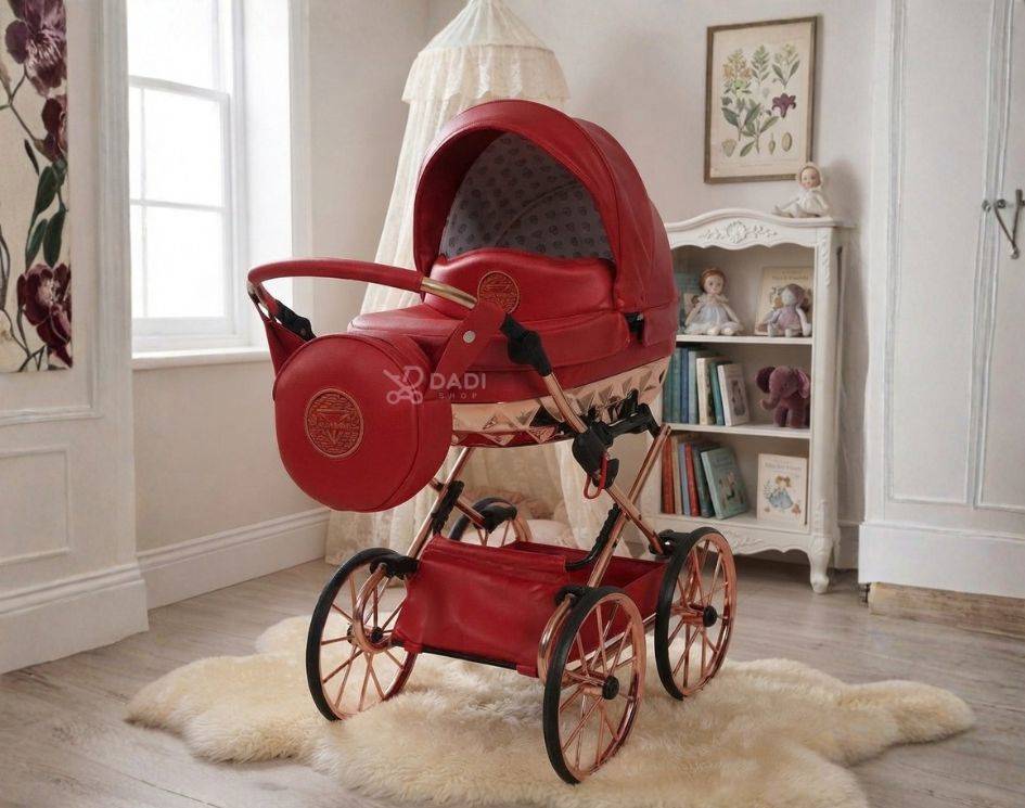 Luxury red Junama Rudolf doll pram with rose gold details placed on a fluffy rug inside a stylish little girl's bedroom.